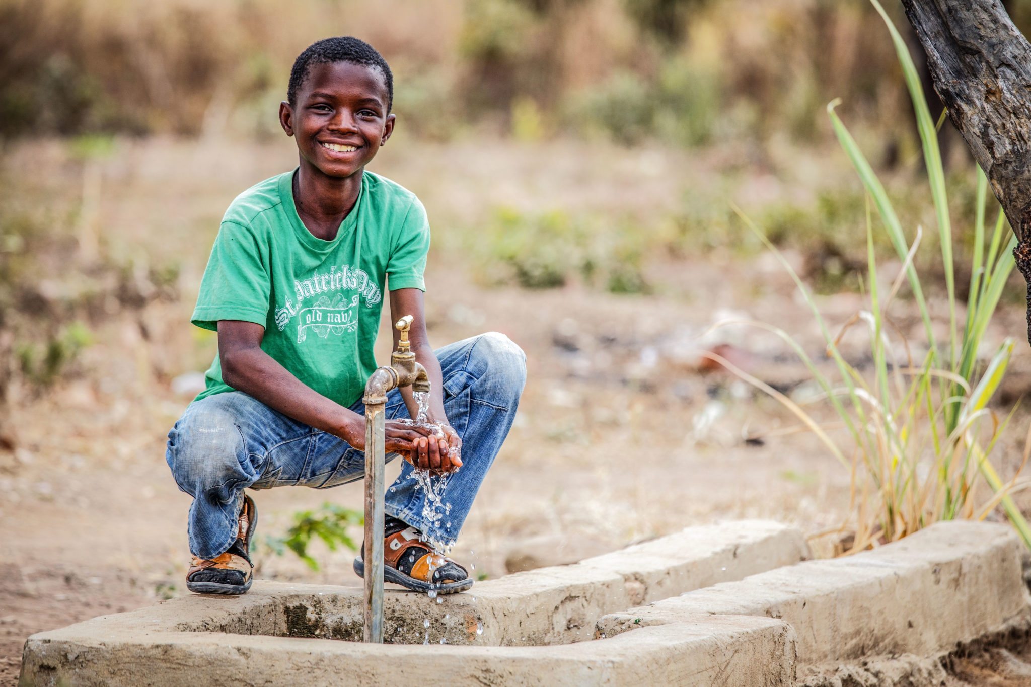 Kid enjoying access to water.